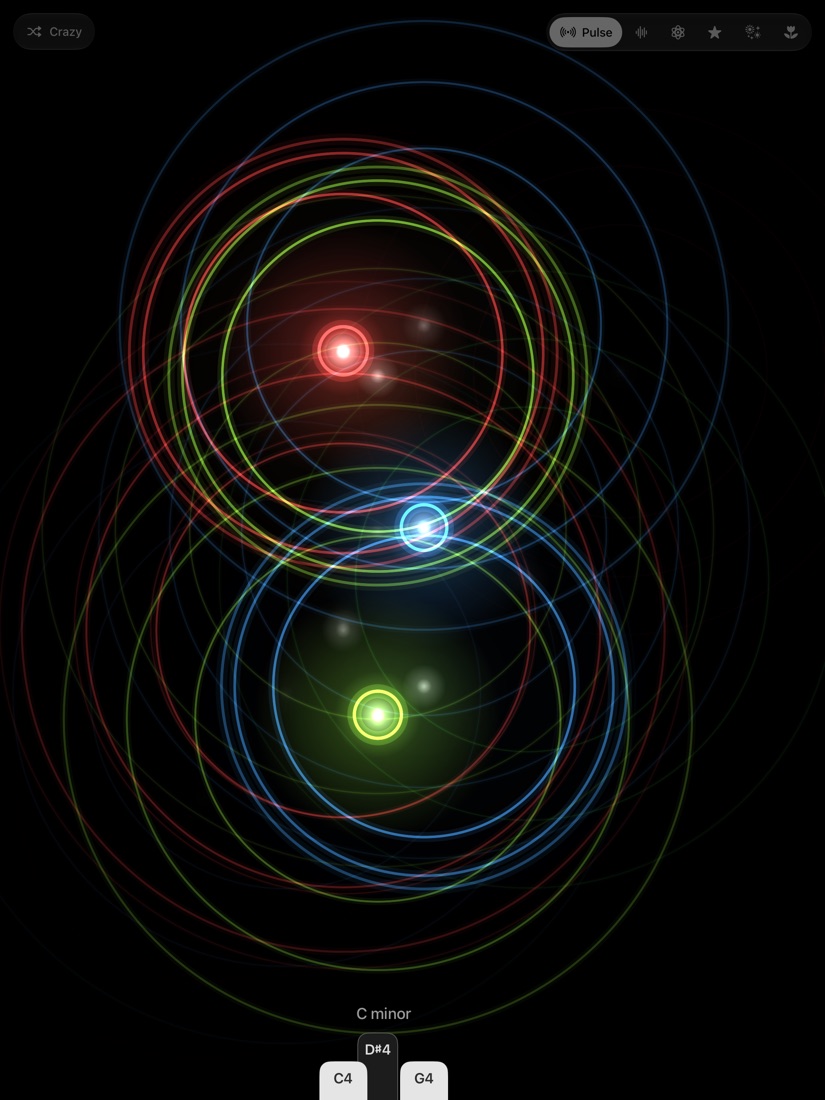 Coloured rings spreading across a black screen, with tabs naming the keys C4, D sharp 4 and G4 and the chord C minor